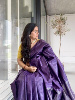 Purple tussar silk saree styled for festive occasions with elegant drape