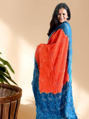 Blue border and pallu on orange cotton Bandhani saree