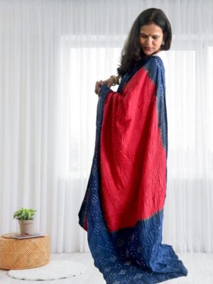 Navy border and pallu on red cotton Bandhani saree