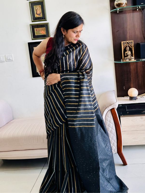 Sequin pallu detail on black Tussar silk saree